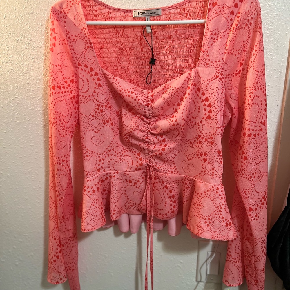 ❤️BCBGeneration Pink Heart Print Ruched Peplum Long Sleeve Top😍 NWOT